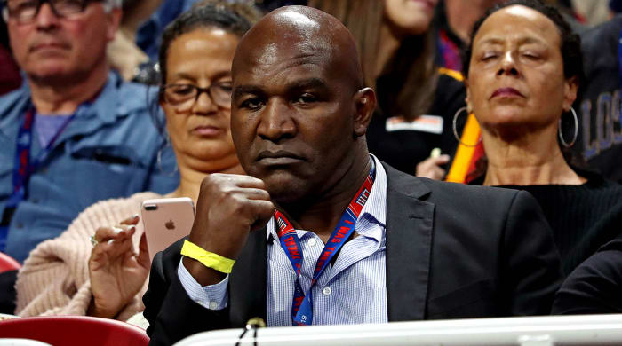 Why is Evander Holyfield back in the ring at 58 years old?